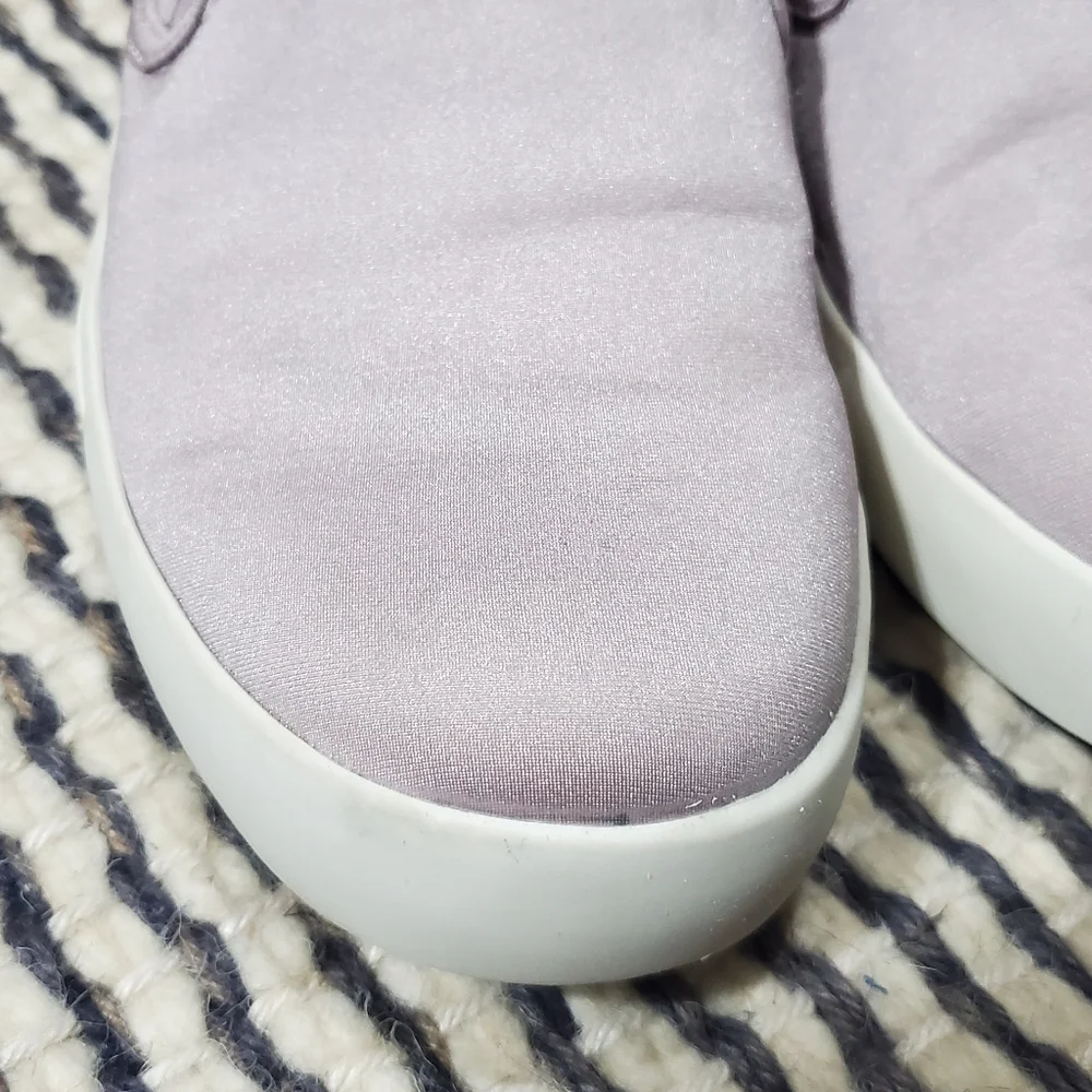 Call it spring purple flat slip on Sneakers shoes.